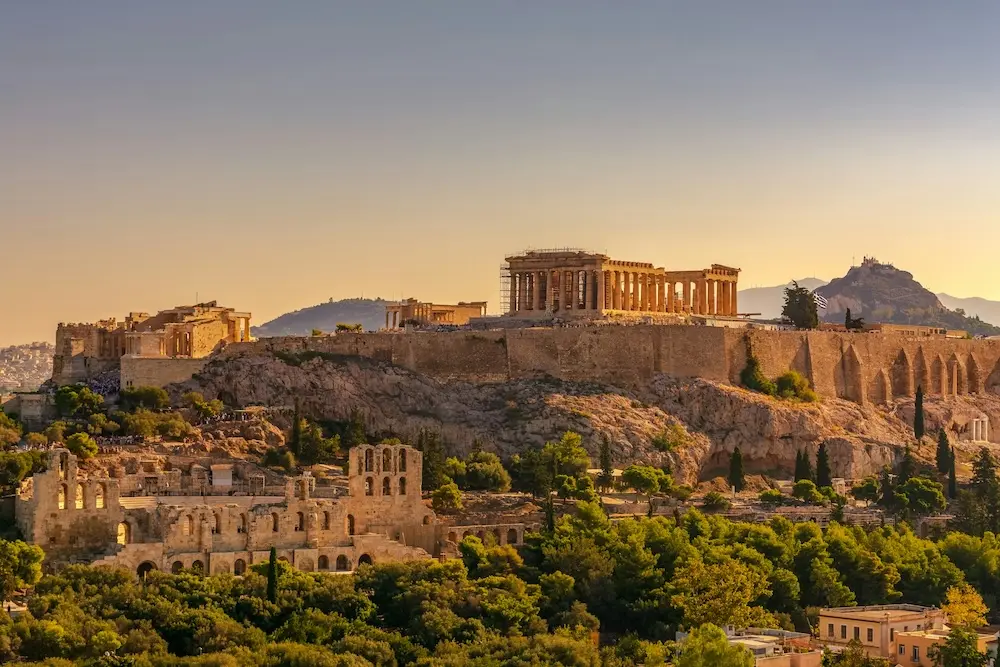 Acropolis of Athens with the Parthenon at golden hour.